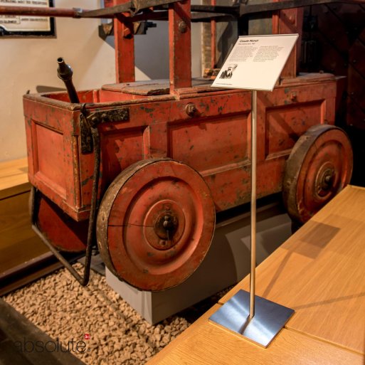 The pinnacle label holder displaying information for an antique fire engine vehicle.